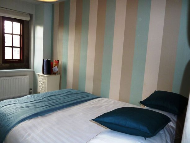 Imagen de la habitación del Hotel The Manor House. Foto 10