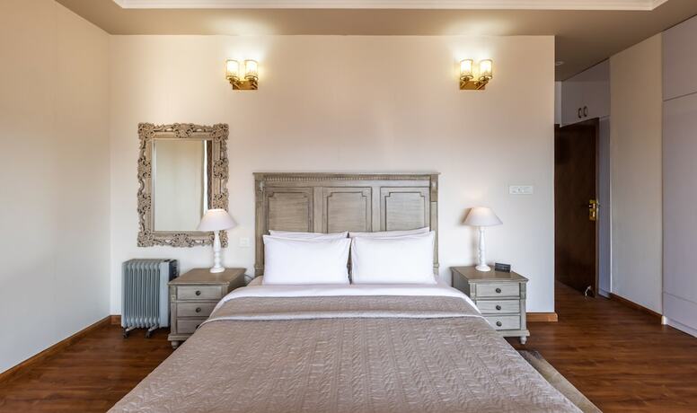 Imagen de la habitación del Hotel The Manor Luxury Apartments. Foto 19