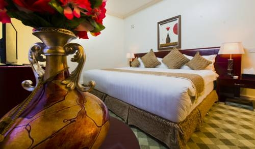 Imagen de la habitación del Hotel The Manor Nyarutarama. Foto 2