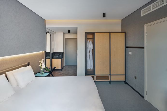 Imagen de la habitación del Hotel The Manor by JA. Foto 6