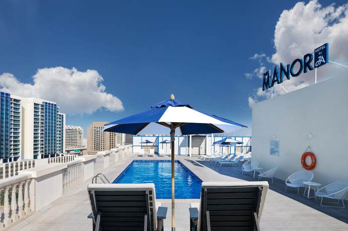 Imagen de la piscina del Hotel The Manor by JA. Foto 20