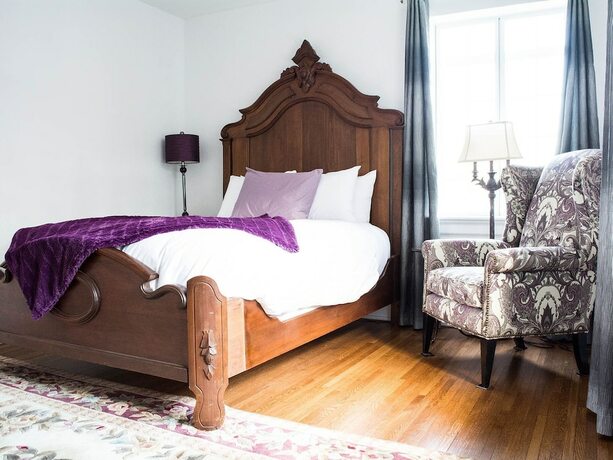 Imagen de la habitación del Hotel The Manor on Front. Foto 19