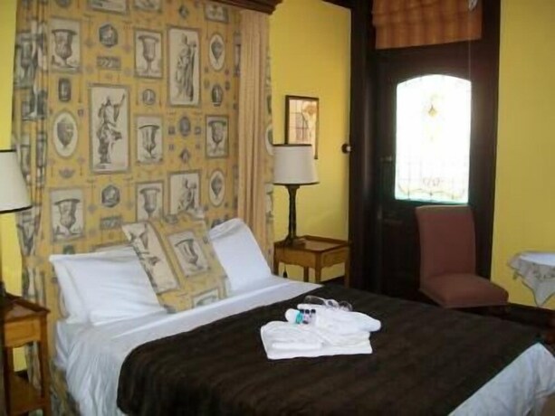 Imagen de la habitación del Hotel The Manse. Foto 26