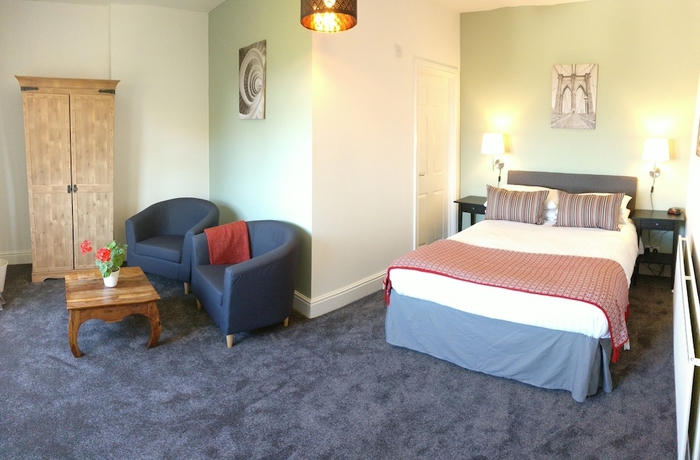 Imagen de la habitación del Hotel The Mansion Bed and Breakfast. Foto 7