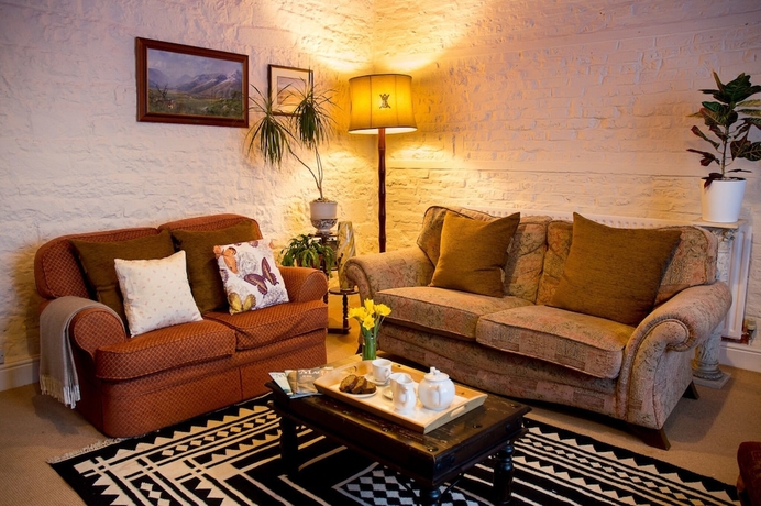 Imagen del bar/restaurante del Hotel The Mansion Bed and Breakfast. Foto 6