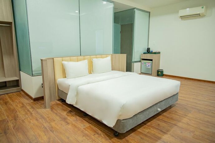 Imagen de la habitación del Hotel The Mansion Bien Hoa. Foto 12