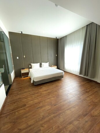 Imagen de la habitación del Hotel The Mansion Bien Hoa. Foto 14