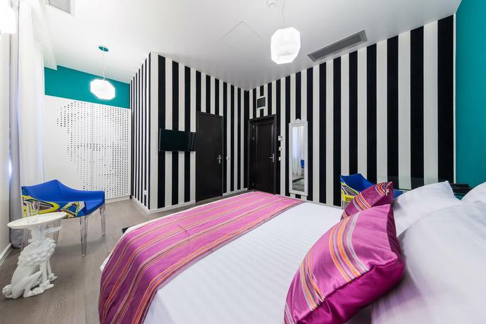 Imagen de la habitación del Hotel The Mansion Boutique. Foto 2