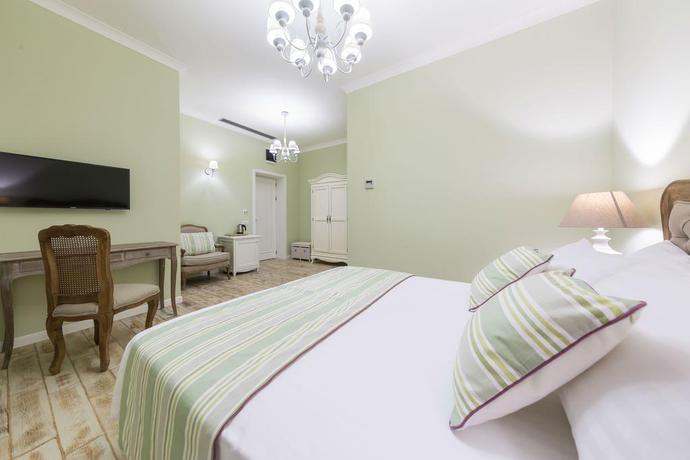 Imagen de la habitación del Hotel The Mansion Boutique. Foto 13