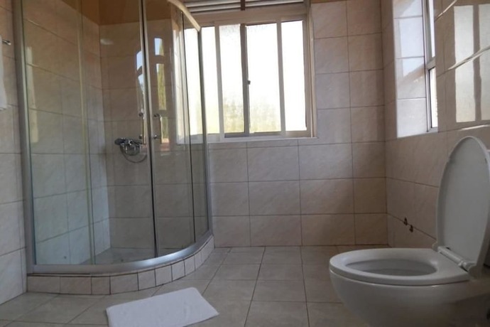 Imagen de la habitación del Hotel The Mansion. Foto 14