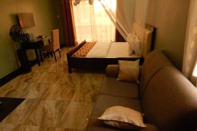 Imagen de la habitación del Hotel The Mansion. Foto 16