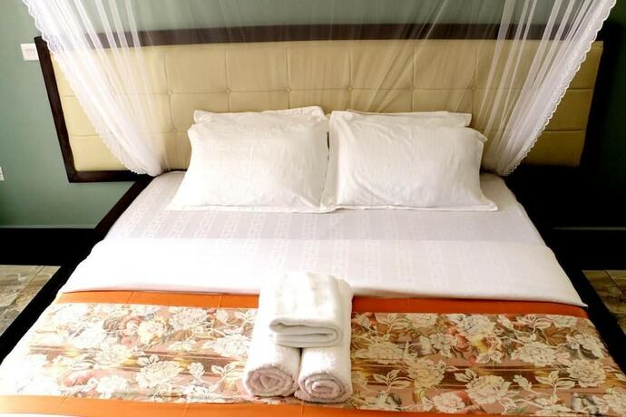 Imagen de la habitación del Hotel The Mansion. Foto 20