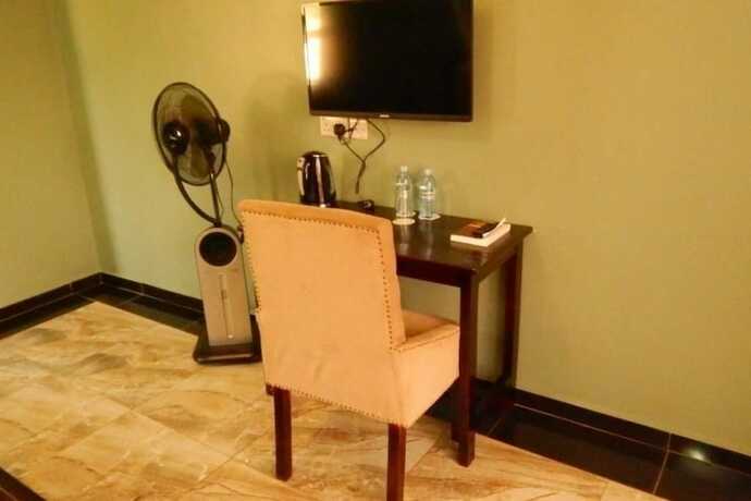 Imagen de la habitación del Hotel The Mansion. Foto 22