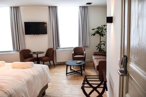 Imagen de la habitación del Hotel The Mansion - Heirloom Hotels. Foto 7