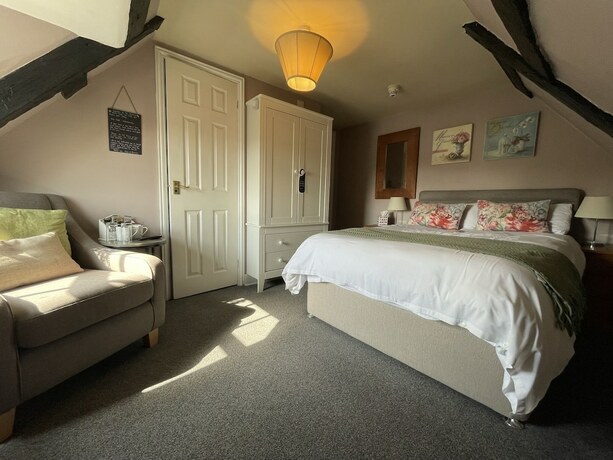 Imagen de la habitación del Hotel The Mansion House. Foto 13