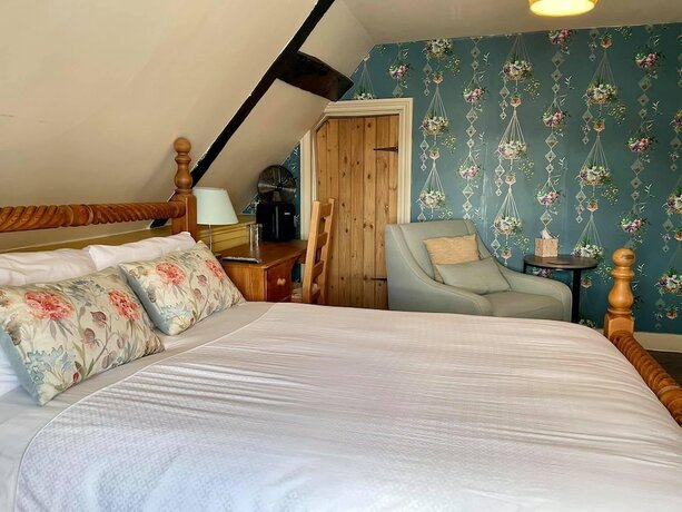 Imagen de la habitación del Hotel The Mansion House. Foto 19