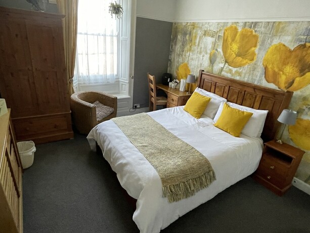 Imagen de la habitación del Hotel The Mansion House. Foto 20