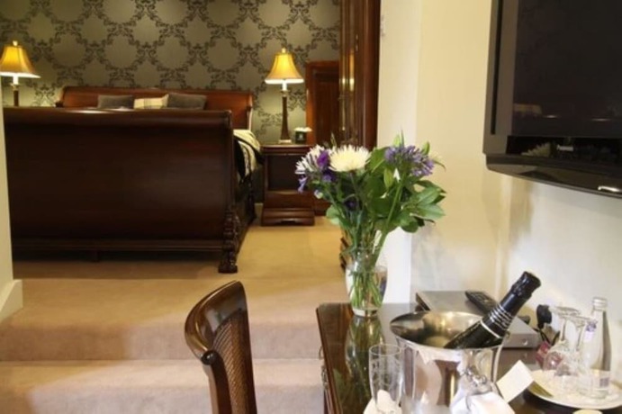 Imagen de la habitación del Hotel The Mansion House Hotel. Foto 9