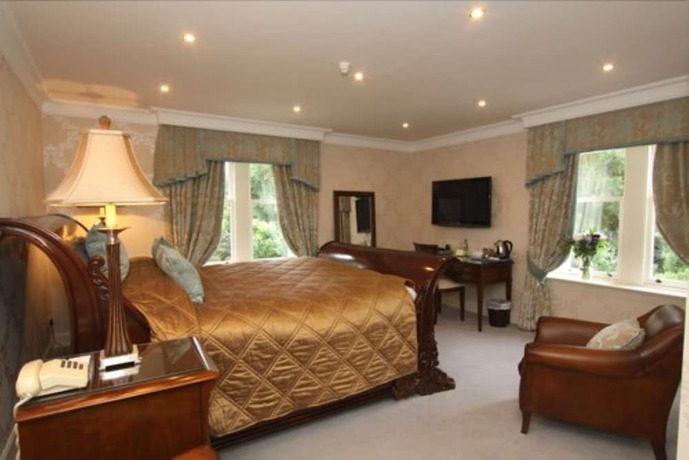 Imagen de la habitación del Hotel The Mansion House Hotel. Foto 10