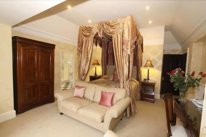 Imagen de la habitación del Hotel The Mansion House Hotel. Foto 11