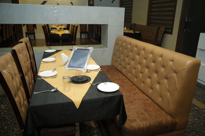 Imagen del bar/restaurante del Hotel The Mansion, Mathura. Foto 4