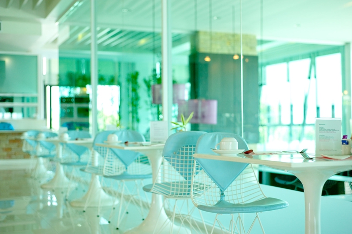 Imagen del bar/restaurante del Hotel The Mantrini Chiang Rai. Foto 3