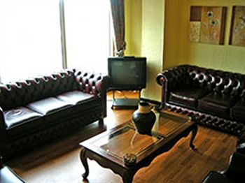 Imagen de la habitación del Hotel The Manuela Rose. Foto 7