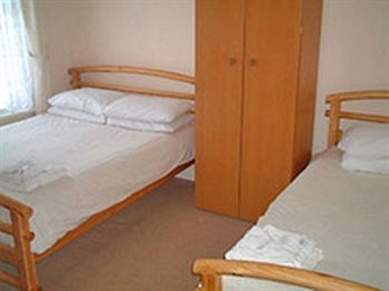 Imagen de la habitación del Hotel The Manuela Rose. Foto 8