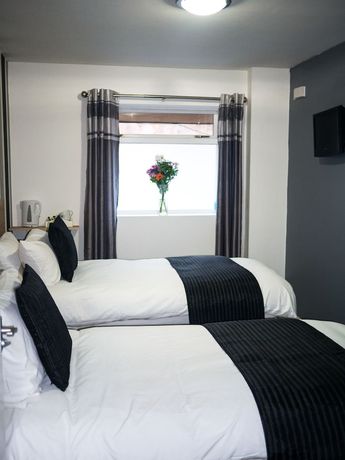 Imagen de la habitación del Hotel The Maple. Foto 2