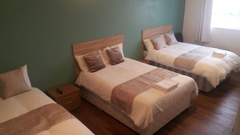 Imagen de la habitación del Hotel The Maple. Foto 6