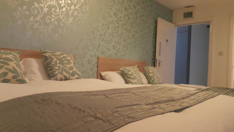Imagen de la habitación del Hotel The Maple. Foto 10