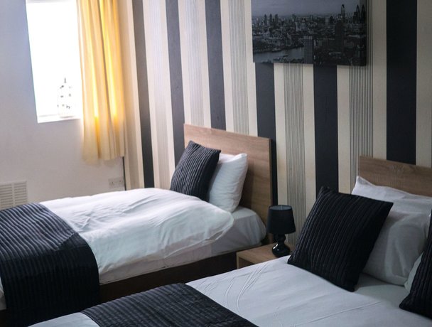 Imagen de la habitación del Hotel The Maple. Foto 16