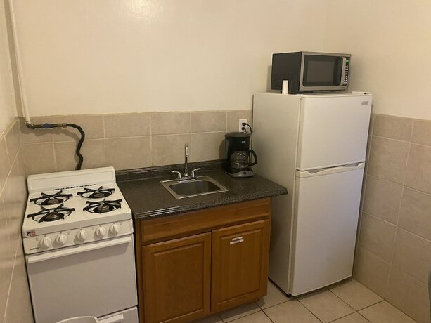 Imagen de la habitación del Hotel The Maple Motel Erie. Foto 6