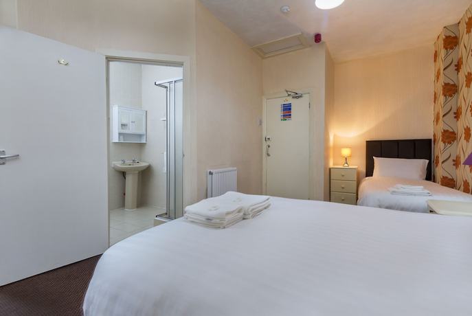 Imagen de la habitación del Hotel The Maples. Foto 19