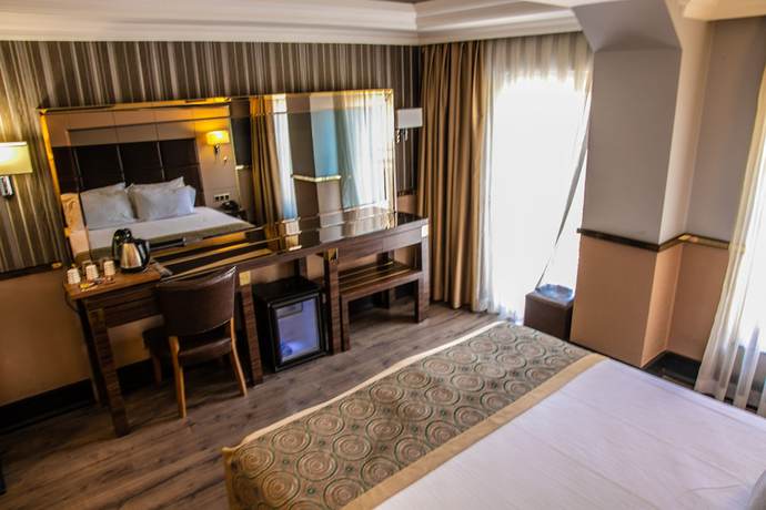 Imagen de la habitación del Hotel The Mara Palace Otel. Foto 10