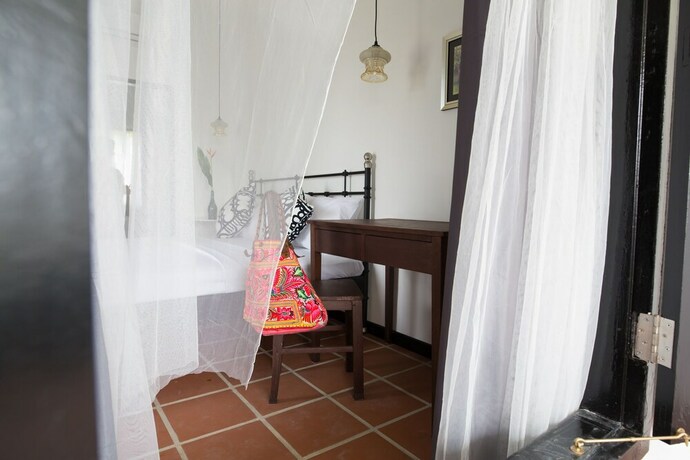 Imagen de la habitación del Hotel The Marian Boutique Lodging House. Foto 11