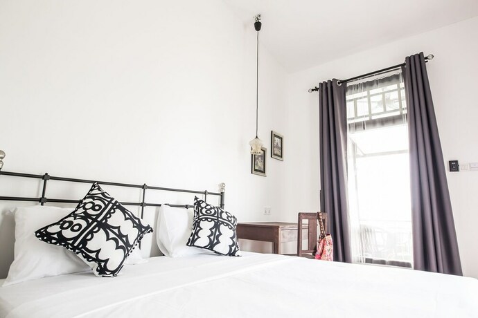 Imagen de la habitación del Hotel The Marian Boutique Lodging House. Foto 15