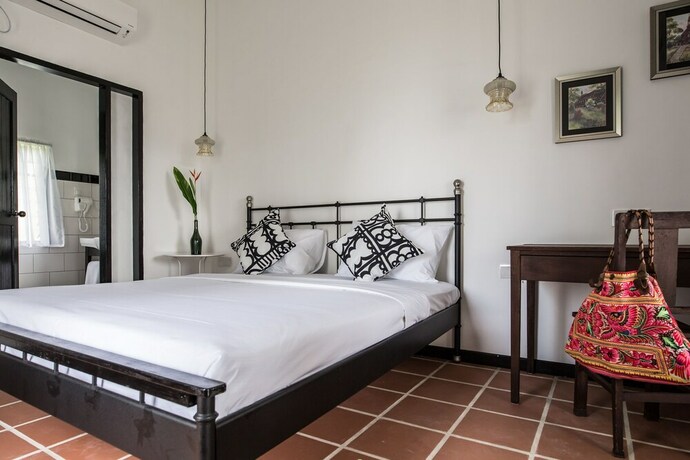 Imagen de la habitación del Hotel The Marian Boutique Lodging House. Foto 18