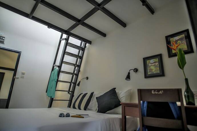 Imagen de la habitación del Hotel The Marian Boutique Lodging House. Foto 19