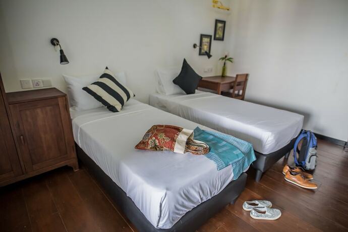 Imagen de la habitación del Hotel The Marian Boutique Lodging House. Foto 20