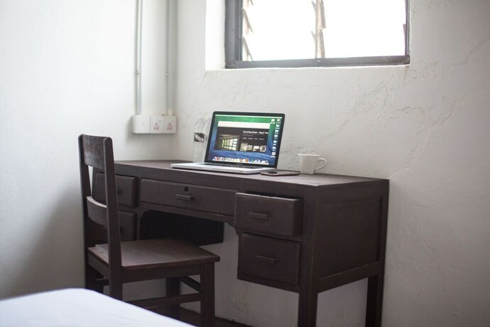 Imagen de la habitación del Hotel The Marian Boutique Lodging House. Foto 28