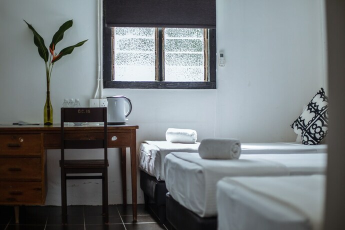 Imagen de la habitación del Hotel The Marian Boutique Lodging House. Foto 31