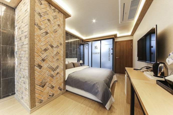 Imagen de la habitación del Hotel The Marine View. Foto 14