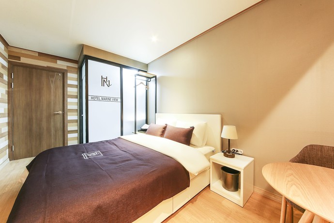 Imagen de la habitación del Hotel The Marine View. Foto 15