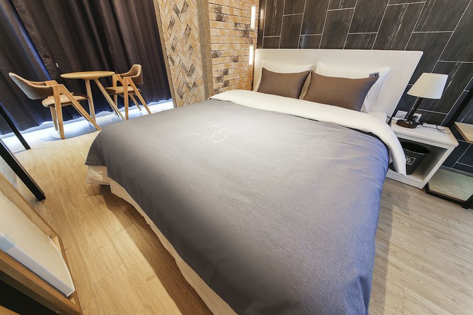 Imagen de la habitación del Hotel The Marine View. Foto 17