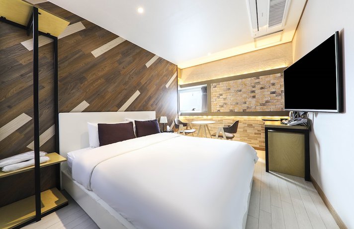 Imagen de la habitación del Hotel The Marine View. Foto 18