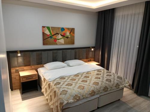 Imagen de la habitación del Hotel The Marine, Yeşilyalı. Foto 18