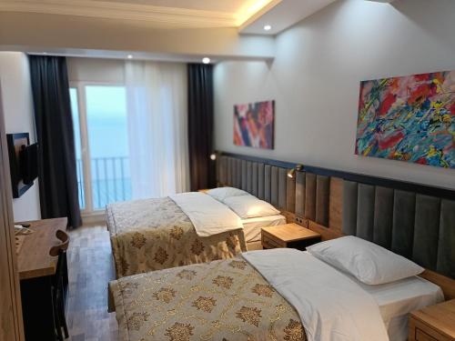 Imagen de la habitación del Hotel The Marine, Yeşilyalı. Foto 19