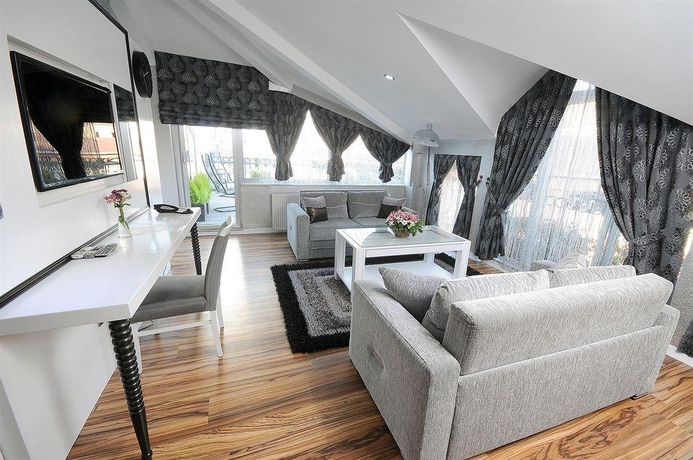 Imagen de la habitación del Hotel The Marions Suite. Foto 16