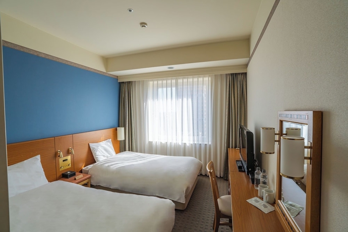 Imagen de la habitación del Hotel The Mark Grand. Foto 2